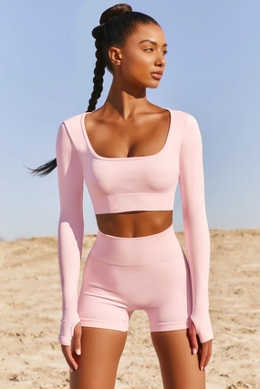 Accomplish Seamless Long Sleeve Crop Top in Pink Tops - tops on sale