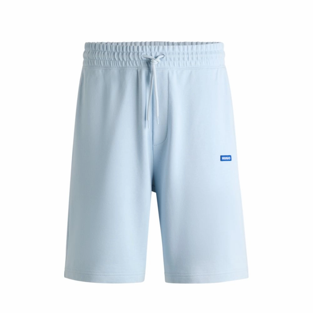 Cotton-terry shorts with blue logo patch