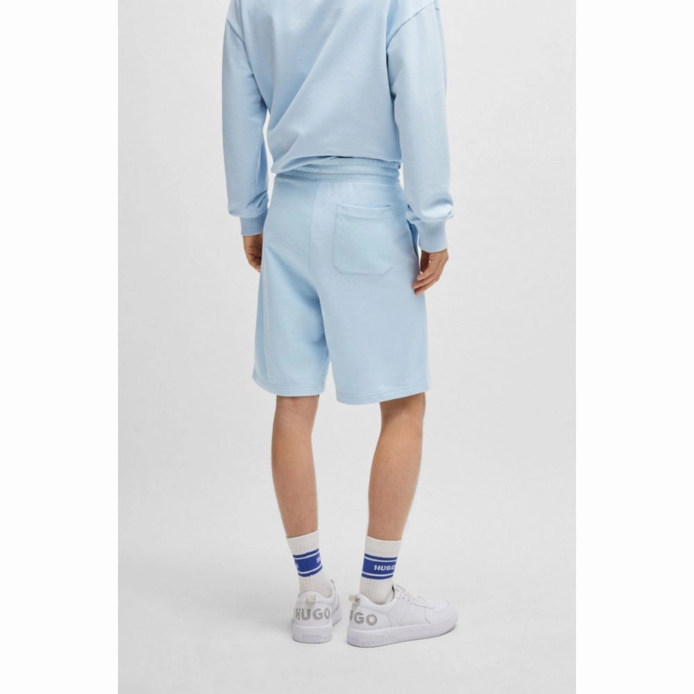 Cotton-terry shorts with blue logo patch