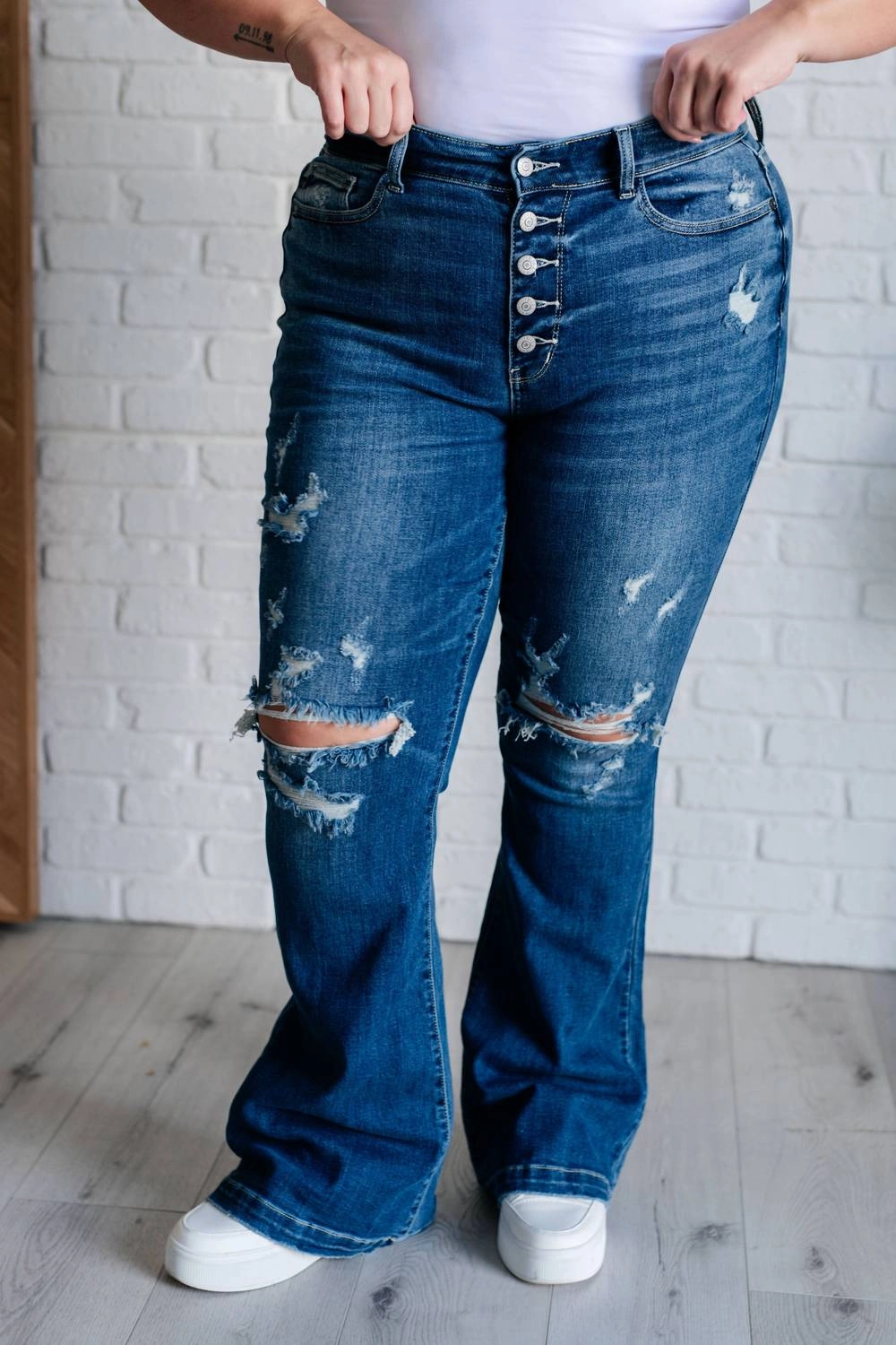 Mid Rise Distressed Button Fly Flare In Blue