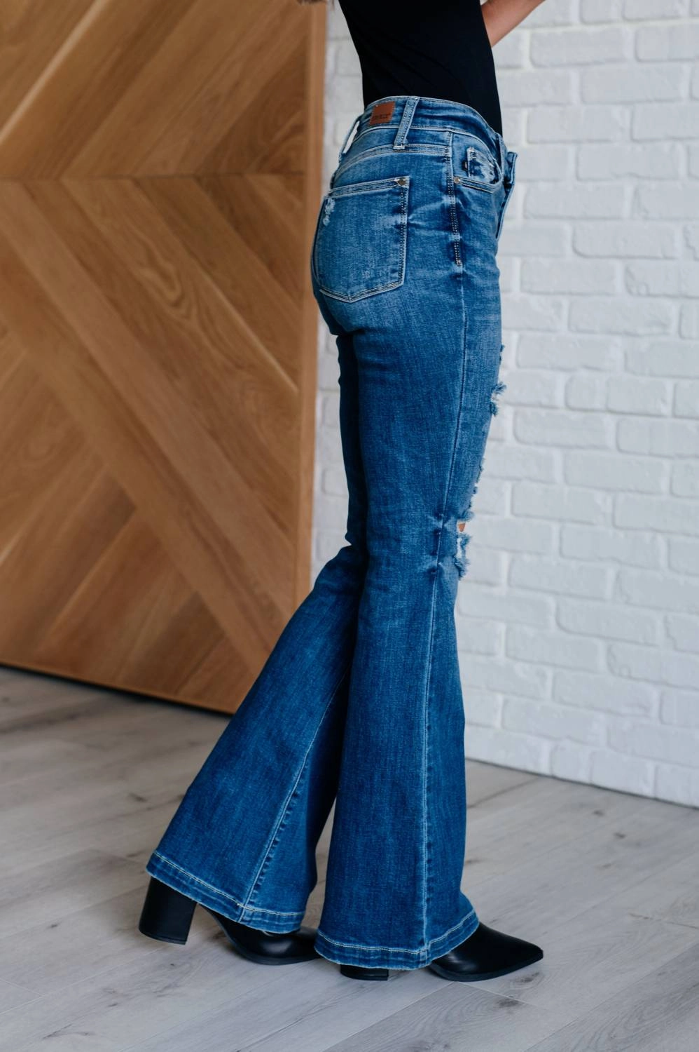 Mid Rise Distressed Button Fly Flare In Blue