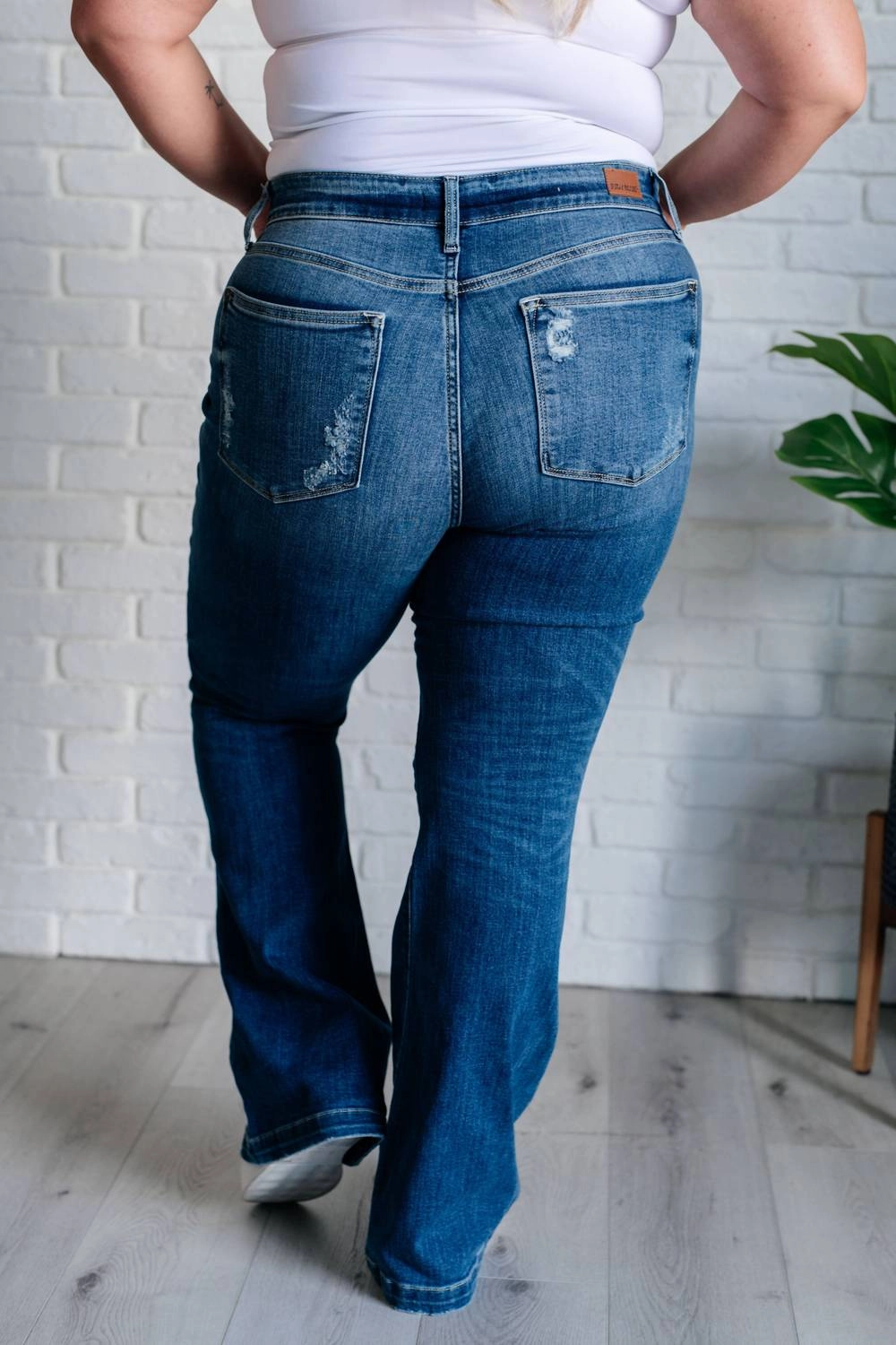 Mid Rise Distressed Button Fly Flare In Blue