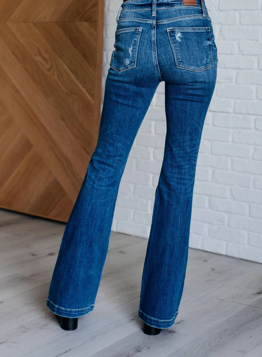 Mid Rise Distressed Button Fly Flare In Blue