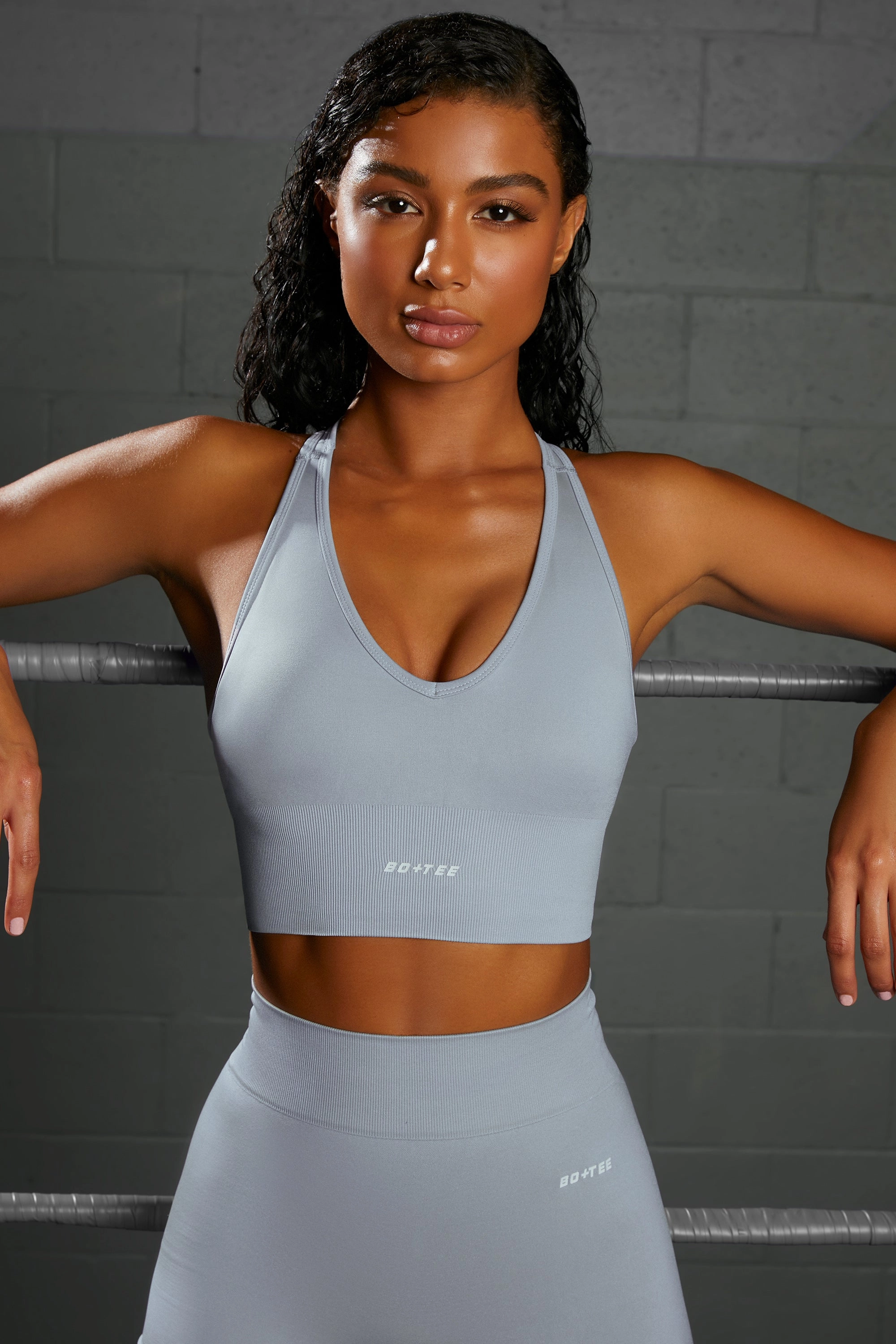 Overhaul Racer Knot Back Seamless Crop Top in Blue