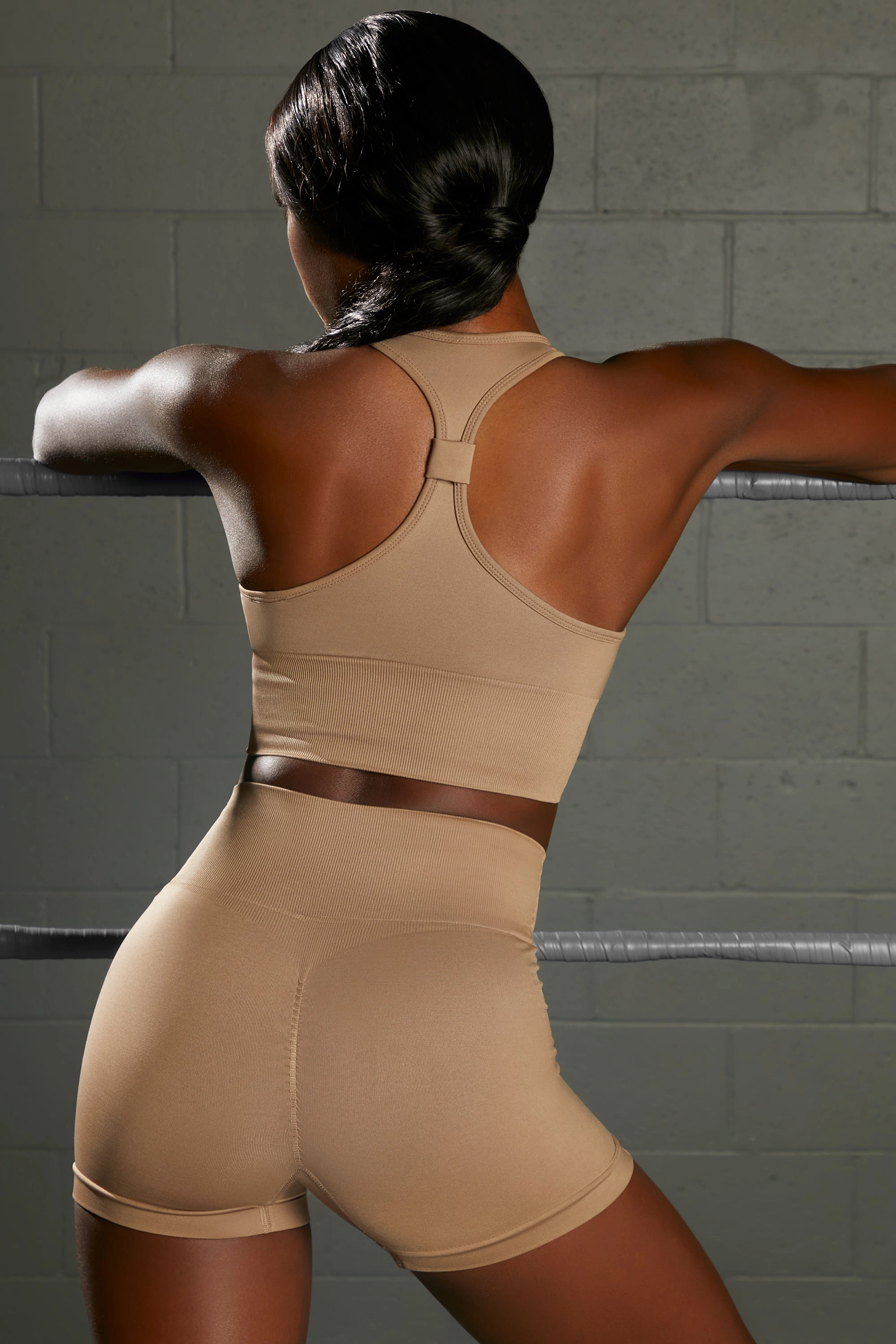 Overhaul Racer Knot Back Seamless Crop Top in Brown