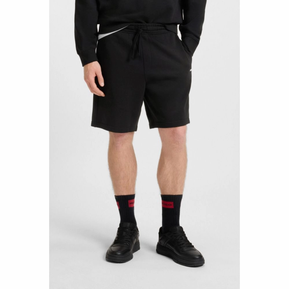 Relaxed-fit shorts in cotton terry with logo print