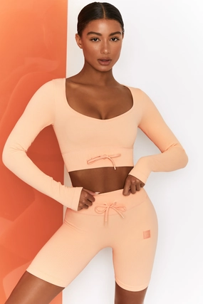 Time Check Ribbed Long Sleeve Crop Top in Peach Tops - basic tees cheap