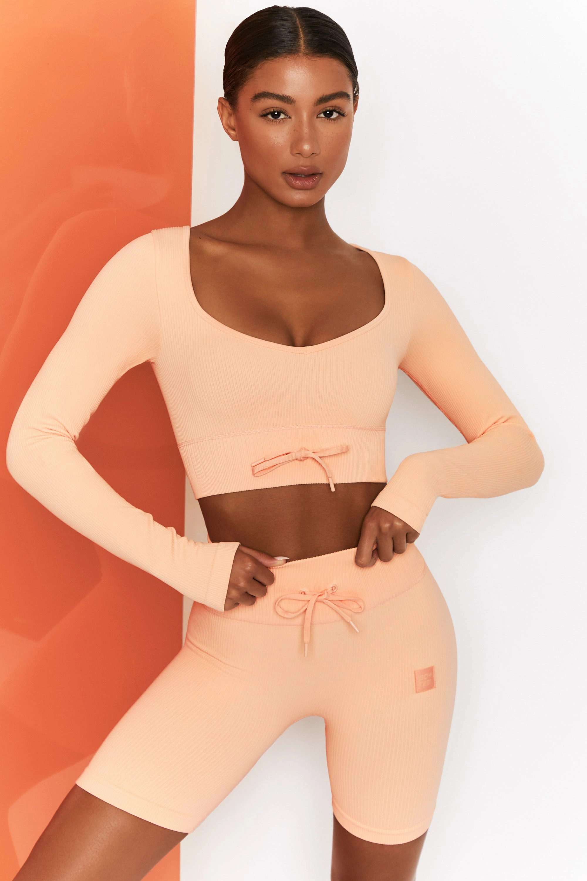Time Check Ribbed Long Sleeve Crop Top in Peach Tops - tops on sale